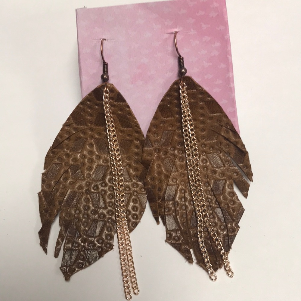 Handmade leather feather earrings.